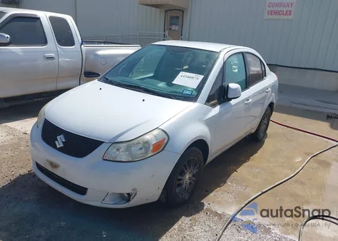 2012 Suzuki Sx4 из США, поврежденный, VIN JS2YC5A35C6300706